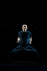 Asian Man practicing Kung Fu