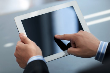 Businessman holding digital tablet