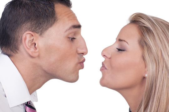 Man and woman preparing to kiss