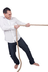 Man pulling on a rope - 52316932