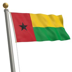 Die Flagge von Guinea-Bissau flattert am Fahnenmast