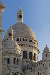 Fototapeta premium Towers of Sacre Coeur Basilica at sunrise, Montmartre, Paris