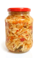 Preserved cabbage and red paprika salad in glass jar