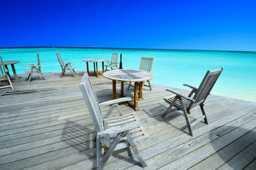Chairs in beach restaurant