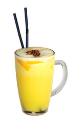 Tasty yellow cocktail with two sticks