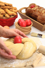 Hands kneading the Easter bread dough