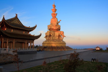 Golden statue and temple in the top of the hill