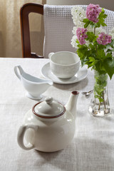 Teapot, milk jug and teacup