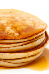 Stack of pancakes isolated on white