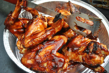 Barbeque Wings in a Tin with Tongs