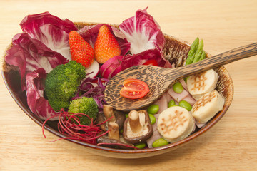 Fusion food,vegetable salad,ham and mursroom