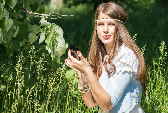 beautiful young woman in nature