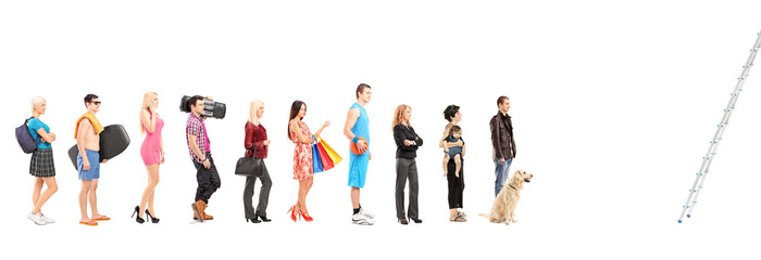 Fototapeta premium Full length portraits of people in a queue waiting to climb a la