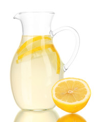 Lemonade in pitcher isolated on white