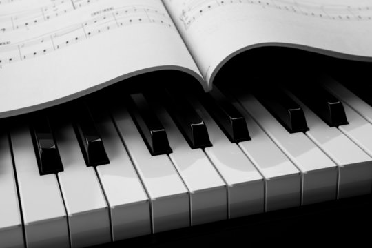 Piano keys and musical book