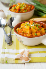 potatoes cooked with tomato paste and herbs