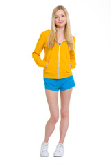 Full length portrait of happy teenager girl