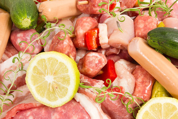 raw meat with rosemary, lemon on a white background