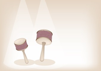 Two Beautiful Cabasa on Brown Stage Background