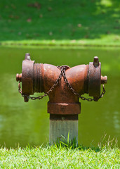 old red fire hydrant on nature background