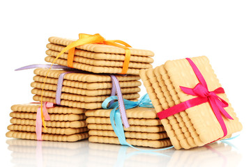 Sweet cookies tied with colorful ribbons isolated on white