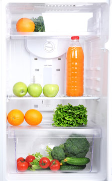 Open refrigerator with vegetarian (diet) food