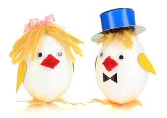 Two chicken toys isolated on white