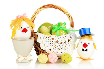 Easter eggs and two chicken toys isolated on white