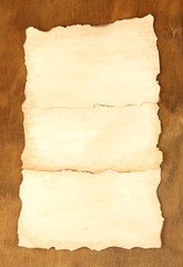 Old papers on wooden background