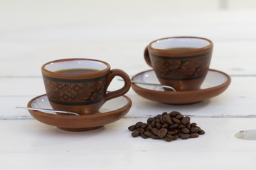Set de cafe, granos de cafe, azucarera y tasas.