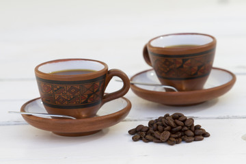 Set de cafe, granos de cafe, azucarera y tasas.