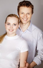 Fototapeta premium young couple over grey background