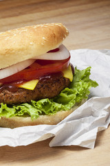 Burger over a wooden background