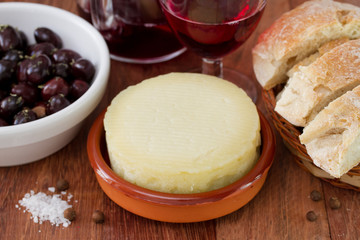 cheese with bread and olives
