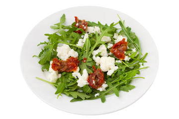 rucola with dry tomato and cheese