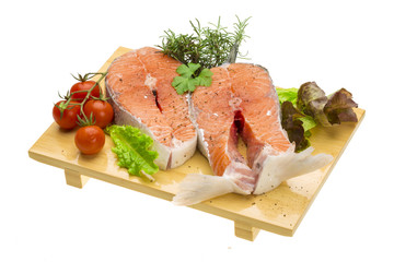 Raw fresh bright salmon with vegetables