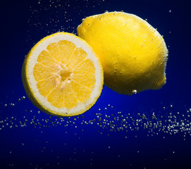 Beautiful lemon close-up photo with carbon dioxide bubbles