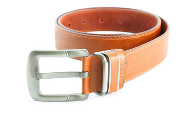 Brown leather belt metal head on white floor.