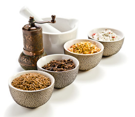 spices in a small ceramic cups