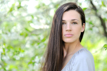 Closeup of beautiful brunette face - outdoor portrait