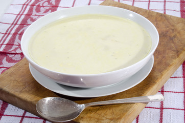 asparagus cream soup in a white bowl