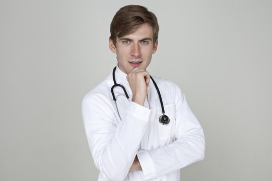 Studio portrait of a confident young doctor