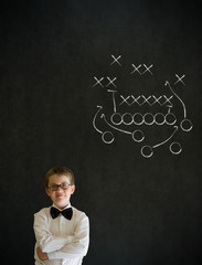 Thinking boy business man with chalk American football strategy