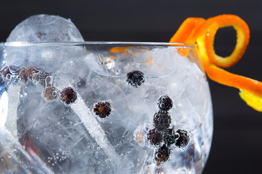 Gin Tonic Cocktail Macro Closeup With Juniper Berries