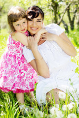 Little girl and mother in the park