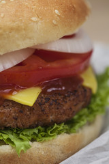 Burger over a wooden background