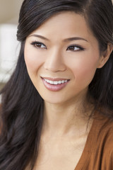 Naklejka premium Beautiful Chinese Oriental Asian Woman Smiling