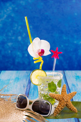 Cubn Mojito cocktail in Caribbean tropical blue wood