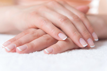 Naklejka premium Beautiful hand with perfect nail french manicure