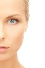 Fototapeta premium half face of beautiful woman